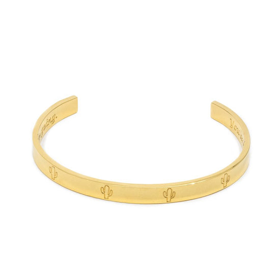Jewmei  perseverance gold cuff bracelet with cactus symbol representing perseverance.