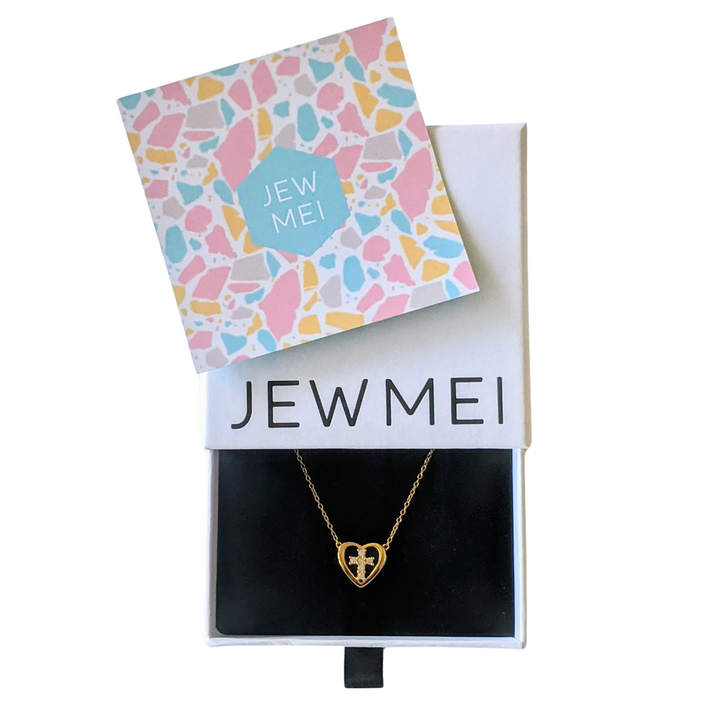 Jewelry box with gold necklace and keepsake message from Jewmei