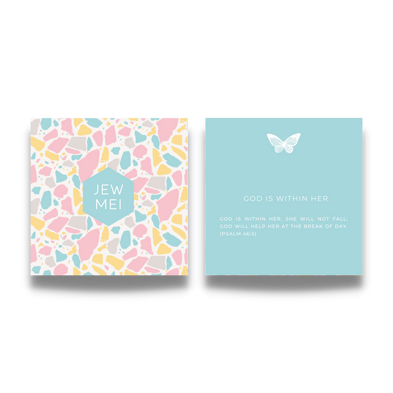 An image of the God is Within Her keepsake message card. The card features stylish typography against a serene backdrop. The text reads, 'God is within her, she will not fall; God will help her at the break of day.' The image showcases the thoughtful design and inspiring message of the card, offering solace and encouragement.