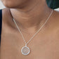 Woman wearing the Shatter the Glass Ceiling Necklace Feminist Jewelry from Jewmei.